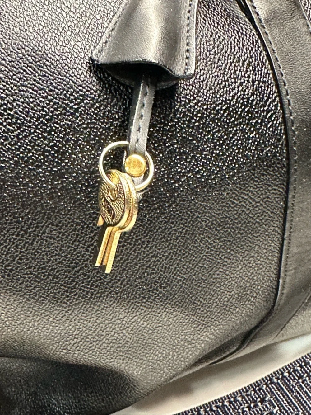 Versace Unisex Black Leather Duffel with Gold Medallion
